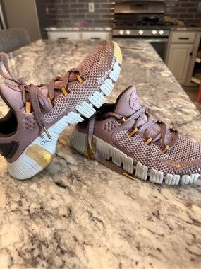 Nike Athletic Knit Mesh Sneakers in Mauve with Gold Accents